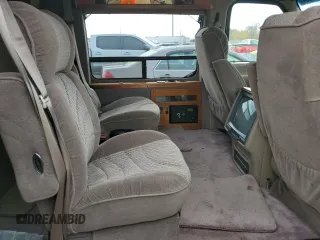 1999 Ford Econoline Cargo with VIN 1FDRE14W6XHA56562, listed as a Copart auction lot 75185804 with 153,673 mi miles and Clean Title. Bid and sale history available at carsss.com. Image 11.