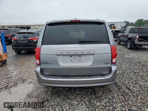 2014 Dodge Grand Caravan SXT z VIN 2C4RDGCG9ER179424, wystawiony jako Copart lot #58532245 z przebiegiem 193 409 mil mil oraz Szkoda całkowita • Salvage title. Historia ofert i sprzedaży dostępna na DreamBid. Obrazek 6.