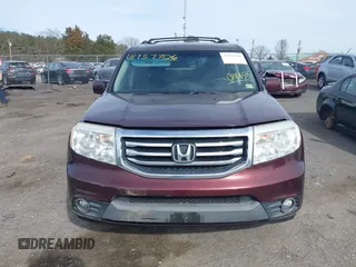 2012 Honda Pilot EX-L with VIN 5FNYF4H5XCB018858, listed as a IAAI auction lot 41757706 with 175,235 mi miles and . Bid and sale history available at carsss.com. Image 12.