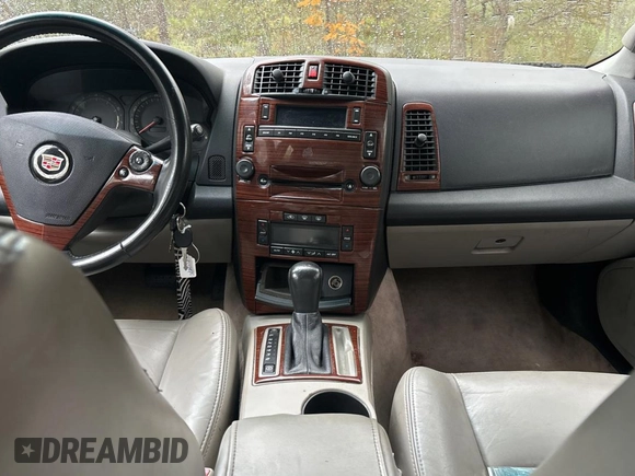 2004 Cadillac CTS with VIN 1G6DM577940109765, listed as a Copart auction lot 79450024 with 221,648 mi miles and Clean Title. Bid and sale history available at carsss.com. Image 9.