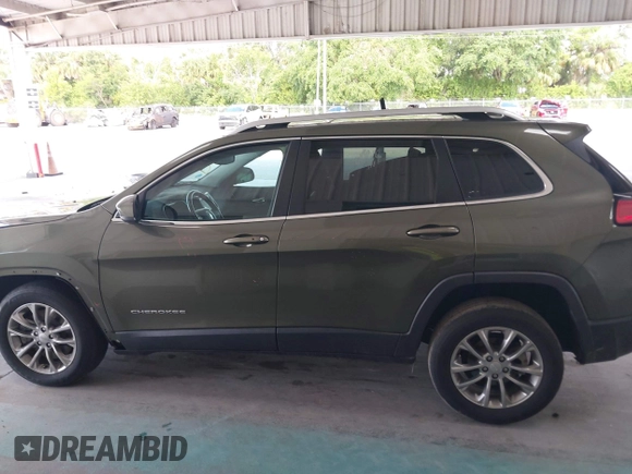 2021 Jeep Cherokee Altitude with VIN 1C4PJLLB5MD203569, listed as a IAAI auction lot 42559737 with 53,961 mi miles and . Bid and sale history available at DreamBid. Image 15.