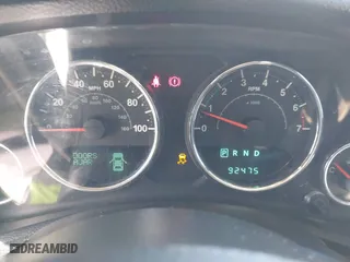 2012 Jeep Wrangler Unlimited Sahara with VIN 1C4BJWEG2CL117080, listed as a IAAI auction lot 41868590 with 92,475 mi miles. Bid and sale history available at carsss.com. Image 7.