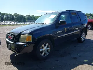 2005 GMC Envoy SLE with VIN 1GKDS13S452208252, listed as a IAAI auction lot 42357457 with 197,419 mi miles and . Bid and sale history available at DreamBid. Image 2.