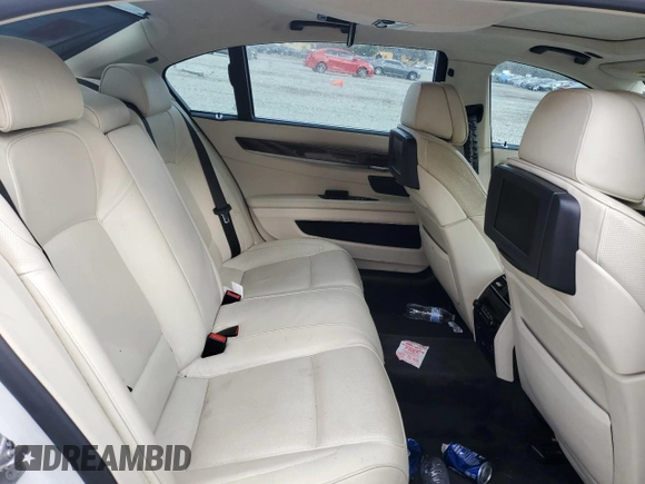 2010 BMW 7 Series 750Li с VIN WBAKB8C50ACY63368, выставлен на аукционе Copart как лот 87160534 с пробегом Не указан миль и Списание • Salvage title. История ставок и продаж доступна на DreamBid. Изображение 11.