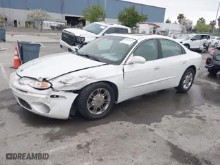 2001 Oldsmobile Aurora with VIN 1G3GS64C114109142, listed as a IAAI auction lot 41974652 with 81,395 mi miles. Bid and sale history available at carsss.com. Image 2.