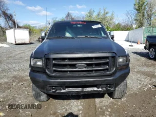 1999 Ford F-250 XL with VIN 1FTNX21L5XEA67499, listed as a Copart auction lot 50822095 with 480,067 mi miles and Salvage title. Bid and sale history available at DreamBid. Image 5.