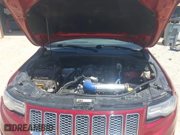 2014 Jeep Grand Cherokee Summit with VIN 1C4RJFJT1EC237358, listed as a IAAI auction lot 42602245 with 106,821 mi miles and . Bid and sale history available at DreamBid. Image 10.