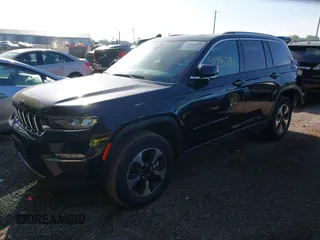 2023 Jeep Grand Cherokee with VIN 1C4RJYB68PC648859, listed as a IAAI auction lot 42267180 with 29,809 mi miles and . Bid and sale history available at DreamBid. Image 2.