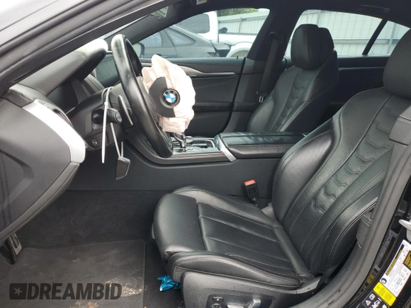 2022 BMW 8 Series M850i z VIN WBAGV8C02NCK08667, wystawiony jako Copart lot #55632805 z przebiegiem 22 737 mil mil oraz Szkody całkowita. Historia ofert i sprzedaży dostępna na DreamBid. Obrazek 7.
