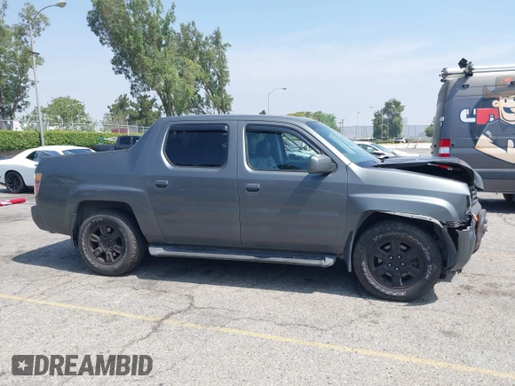 2007 Honda Ridgeline RTL with VIN 2HJYK16547H502601, listed as a IAAI auction lot 42484634 with 197,253 mi miles and . Bid and sale history available at DreamBid. Image 13.