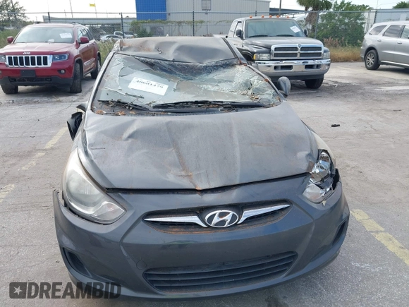 2012 Hyundai Accent GS with VIN KMHCT5AE7CU050253, listed as a IAAI auction lot 40601479 with 88,734 mi miles. Bid and sale history available at carsss.com. Image 6.