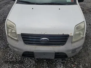 2011 Ford Transit Connect XL с VIN NM0LS6AN0BT051047, выставлен на аукционе Copart как лот 55883385 с пробегом 198 476 миль миль и Чистый • Clean title. История ставок и продаж доступна на DreamBid. Изображение 12.