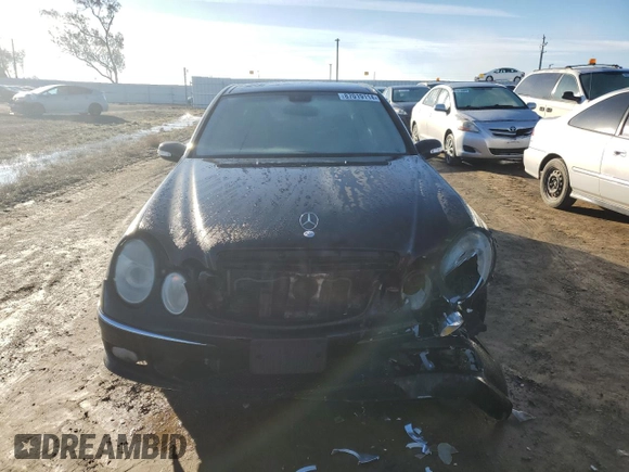 2003 Mercedes-Benz E-Class 5.5L AMG with VIN WDBUF76J73A364731, listed as a Copart auction lot 87019114 with 187,696 mi miles and Salvage Title. Bid and sale history available at carsss.com. Image 5.
