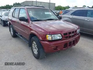 2002 Isuzu Rodeo S with VIN 4S2CK58W024311358, listed as a IAAI auction lot 42556244 with 134,187 mi miles and . Bid and sale history available at DreamBid. Image 1.
