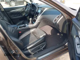 2014 Infiniti Q50 Hybrid Sport with VIN JN1AV7AR7EM703030, listed as a IAAI auction lot 41661844 with 128,202 mi miles. Bid and sale history available at carsss.com. Image 5.