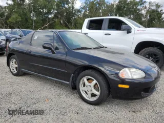 1997 Honda del Sol Si with VIN JHMEH6263VS001799, listed as a Copart auction lot 73735194 with 52,448 mi miles and Salvage Title. Bid and sale history available at carsss.com. Image 4.