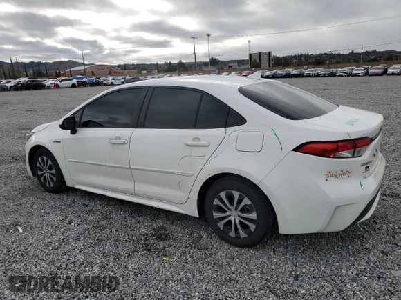 2021 Toyota Corolla Hybrid LE with VIN JTDEAMDE3MJ013373, listed as a Copart auction lot 48709785 with 136,422 mi miles and Salvage Title. Bid and sale history available at carsss.com. Image 2.
