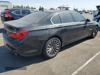 2012 BMW 7 Series 740i with VIN WBAKA4C59CDS99437, listed as a Copart auction lot 73795104 with 120,199 mi miles and Clean Title. Bid and sale history available at carsss.com. Image 3.