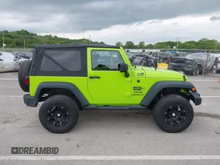 2013 Jeep Wrangler Sport with VIN 1C4AJWAG8DL507944, listed as a IAAI auction lot 42143144 with 70,085 mi miles and . Bid and sale history available at carsss.com. Image 13.