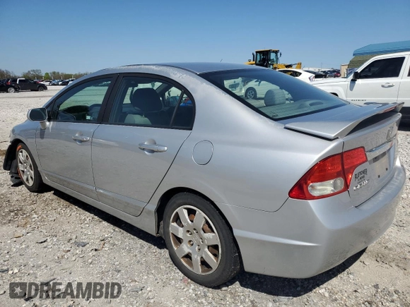 2010 Honda Civic LX with VIN 19XFA1F51AE016877, listed as a Copart auction lot 52275475 with 217,152 mi miles and Salvage Title. Bid and sale history available at DreamBid. Image 2.