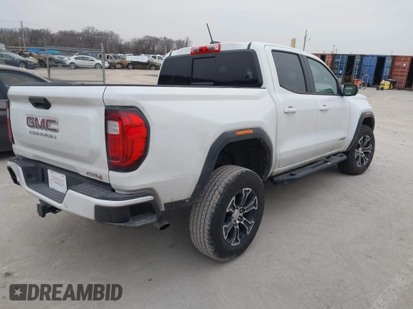 2023 GMC Canyon 4WD AT4 with VIN 1GTP6DEK0P1221777, listed as a IAAI auction lot 41564754 with 21,974 mi miles. Bid and sale history available at carsss.com. Image 4.