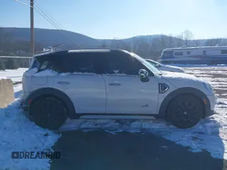 2018 MINI Countryman Cooper S z VIN WMZYT5C39J3E19190, wystawiony jako IAAI lot #41364349 z przebiegiem 44 941 mil mil oraz . Historia ofert i sprzedaży dostępna na DreamBid. Obrazek 13.