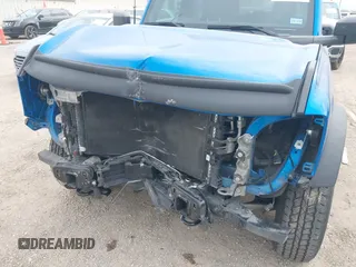 2021 Ford Bronco with VIN 1FMDE5BH7MLA94882, listed as a IAAI auction lot 42354955 with 32,837 mi miles and . Bid and sale history available at DreamBid. Image 6.