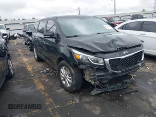 2017 Kia Sedona L with VIN KNDMA5C14H6259003, listed as a IAAI auction lot 40433286 with 1 mi miles. Bid and sale history available at carsss.com. Image 1.