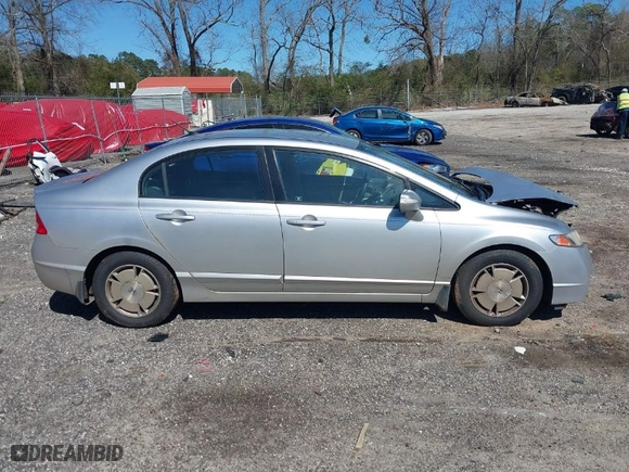 2009 Honda Civic Hybrid with VIN JHMFA36249S000925, listed as a IAAI auction lot 41823981 with 201,346 mi miles. Bid and sale history available at carsss.com. Image 13.