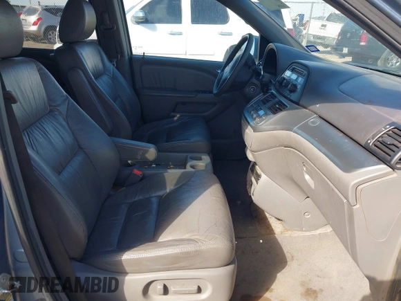 2010 Honda Odyssey EX-L with VIN 5FNRL3H7XAB052742, listed as a IAAI auction lot 41705935 with 205,190 mi miles and . Bid and sale history available at DreamBid. Image 5.