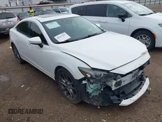 2016 Mazda 6 i Grand Touring with VIN JM1GJ1W54G1429179, listed as a IAAI auction lot 42117223 with 142,319 mi miles and . Bid and sale history available at carsss.com. Image 1.