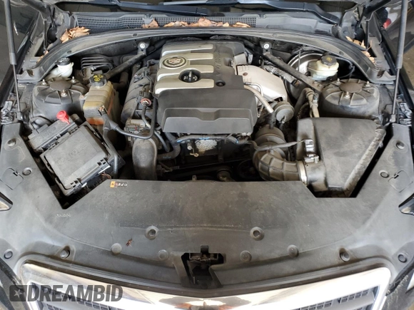 2013 Cadillac ATS z VIN 1G6AG5RXXD0157086, wystawiony jako Copart lot #53612655 z przebiegiem 124 141 mil mil oraz Szkoda całkowita • Salvage title. Historia ofert i sprzedaży dostępna na DreamBid. Obrazek 11.