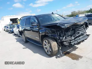 2018 Cadillac Escalade ESV Luxury z VIN 1GYS4HKJ8JR332437, wystawiony jako IAAI lot #41631251 z przebiegiem 140 977 mil mil oraz . Historia ofert i sprzedaży dostępna na DreamBid. Obrazek 1.