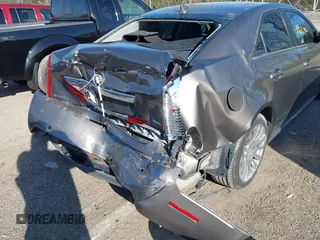 2012 Cadillac CTS Premium with VIN 1G6DS5E3XC0128264, listed as a IAAI auction lot 41964295 with 117,889 mi miles and . Bid and sale history available at DreamBid. Image 6.