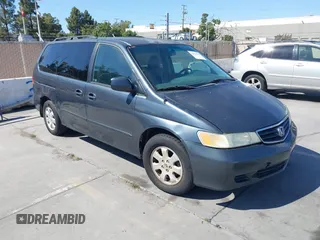 2004 Honda Odyssey EX-L with VIN 5FNRL18964B013477, listed as a IAAI auction lot 42618350 with 262,866 mi miles and . Bid and sale history available at DreamBid. Image 1.