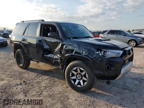 2023 Toyota 4Runner TRD Off Road Premium with VIN JTERU5JR8P6206787, listed as a Copart auction lot 54021565 with 69,724 mi miles and Salvage title. Bid and sale history available at DreamBid. Image 4.