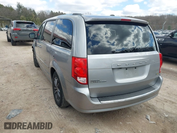 2017 Dodge Grand Caravan SXT with VIN 2C4RDGCG6HR671199, listed as a IAAI auction lot 42031157 with 99,189 mi miles and . Bid and sale history available at DreamBid. Image 3.
