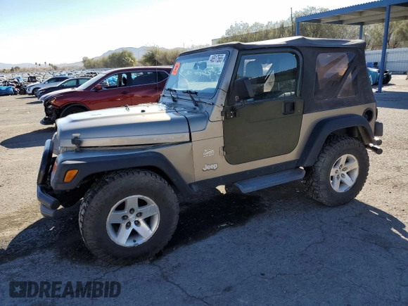 2003 Jeep Wrangler Sahara z VIN 1J4FA59S43P369233, wystawiony jako Copart lot #46517565 z przebiegiem 169 232 mil mil oraz Szkoda całkowita • Salvage title. Historia ofert i sprzedaży dostępna na DreamBid. Obrazek 1.