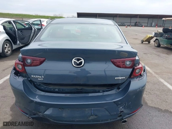 2023 Mazda Mazda3 Sedan 2.5 S Carbon Edition with VIN 3MZBPBCM4PM358964, listed as a IAAI auction lot 41718813 with 34,215 mi miles. Bid and sale history available at carsss.com. Image 6.
