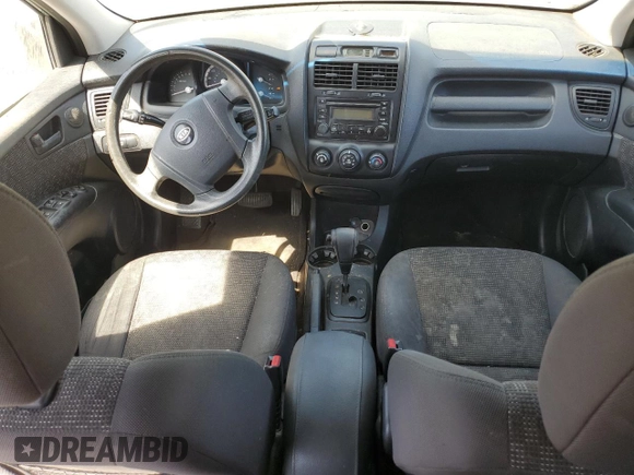 2006 Kia Sportage LX z VIN KNDJF724X67282904, wystawiony jako Copart lot #69264114 z przebiegiem 231 772 mil mil oraz Czysty tytuł • Clean title. Historia ofert i sprzedaży dostępna na DreamBid. Obrazek 8.