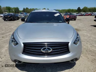 2016 Infiniti QX70 z VIN JN8CS1MWXGM752128, wystawiony jako Copart lot #52147115 z przebiegiem 122 637 mil mil oraz Tytuł czysty. Historia ofert i sprzedaży dostępna na DreamBid. Obrazek 5.