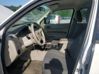2009 Ford Escape XLS with VIN 1FMCU02719KB53740, listed as a Copart auction lot 55210035 with 144,672 mi miles and Salvage title. Bid and sale history available at DreamBid. Image 7.