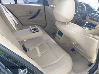 2014 BMW 3 Series 328i xDrive with VIN WBA3G7C57EKN37319, listed as a IAAI auction lot 41699235 with 93,671 mi miles and . Bid and sale history available at carsss.com. Image 8.