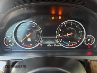 2015 BMW 7 Series 750i xDrive с VIN WBAYB6C5XFD965910, выставлен на аукционе Copart как лот 62613175 с пробегом 173 486 миль миль и Списание • Salvage title. История ставок и продаж доступна на DreamBid. Изображение 9.