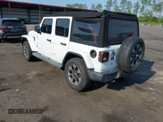 2018 Jeep Wrangler Unlimited Sahara z VIN 1C4HJXEG3JW175226, wystawiony jako IAAI lot #42307456 z przebiegiem 72 875 mil mil oraz . Historia ofert i sprzedaży dostępna na DreamBid. Obrazek 3.