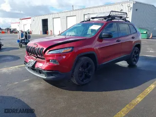2017 Jeep Cherokee Sport with VIN 1C4PJLAB2HW577196, listed as a IAAI auction lot 41698252 with 123,997 mi miles. Bid and sale history available at carsss.com. Image 2.