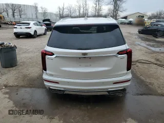 2022 Cadillac XT6 Premium Luxury with VIN 1GYKPFRS2NZ120147, listed as a Copart auction lot 49047855 with 59,691 mi miles and Salvage Title. Bid and sale history available at carsss.com. Image 6.