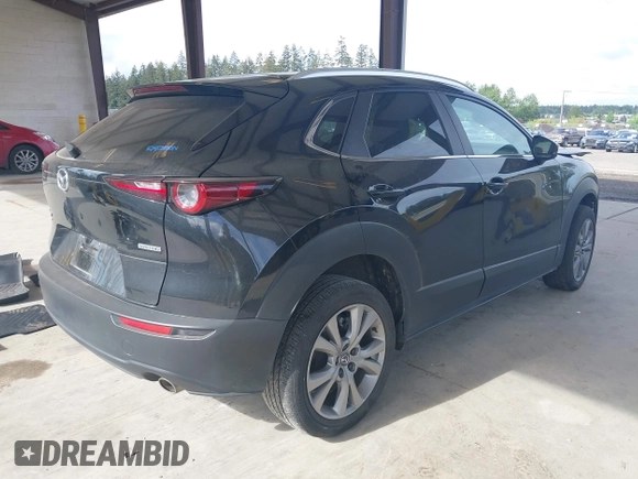 2023 Mazda CX-30 S Carbon Edition with VIN 3MVDMBCMXPM520776, listed as a IAAI auction lot 42205047 with Not provided miles and . Bid and sale history available at DreamBid. Image 4.