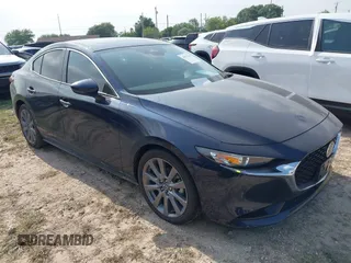 2024 Mazda 3 S Preferred z VIN 3MZBPACMXRM431560, wystawiony jako IAAI lot #41937296 z przebiegiem 9 839 mil mil oraz . Historia ofert i sprzedaży dostępna na DreamBid. Obrazek 1.
