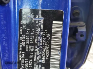 2012 Hyundai Accent SE with VIN KMHCU5AE1CU019559, listed as a Copart auction lot 65235685 with 119,556 mi miles and Salvage title. Bid and sale history available at DreamBid. Image 12.